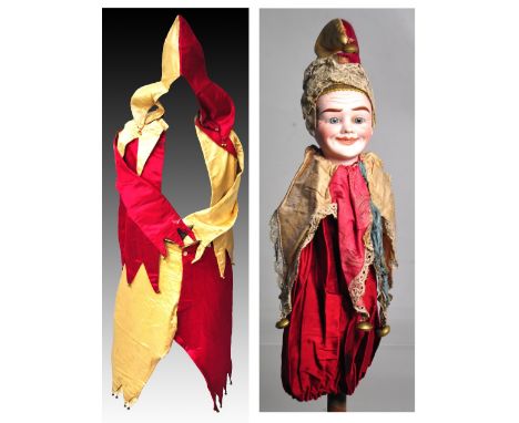 A late 19th century child's silk jesters costume to include jacket, hat, pants, stockings and shoes, also with a 19th century