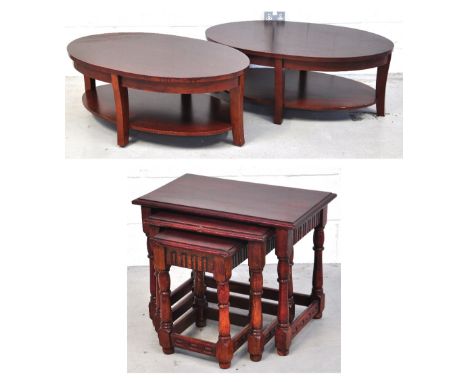 Two modern oval shaped coffee tables, both with lower shelf, width 122cm and a further nest of three tables, height of larges