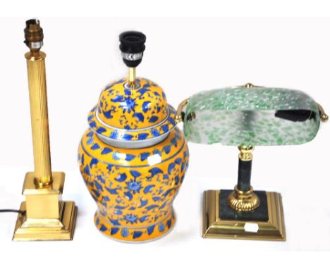Three modern table lamps, one in the form of an Oriental lidded jar, one in the form of a classical brass column and the othe