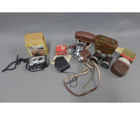 Vintage cameras to include Helena and Starflex Brownie, vintage opera glasses,etc (a lot) 