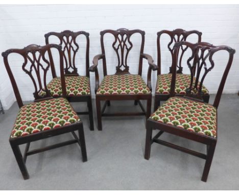 Set of five mahogany Chippendale style dining chairs, including one carver, with scrolling top rails and pierced splats, each