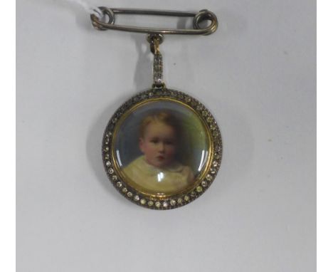 An early 20th century double portrait pendant brooch 