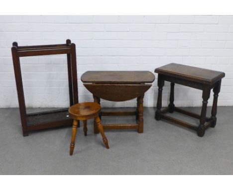 Mixed lot to include an oak stick stand with original metal drip tray, oak drop leaf table, oak stool and a milking stool, ta