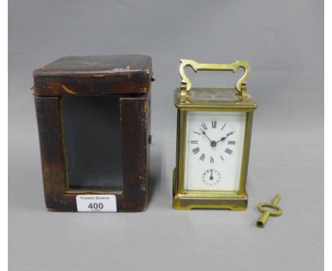 Brass cased carriage alarm clock with leather carry case 15cm including handle 