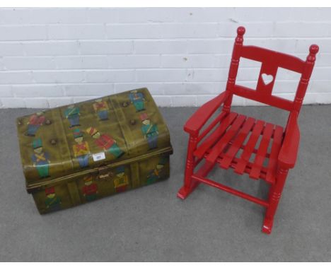 Child's red painted wooden rocking chair and a tin trunk painted with toy soldiers, 50 x 30cm (2)