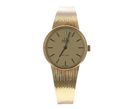 Omega De Ville automatic 18k lady's bracelet watch, circa 1975, case no. 55x 7xxx, champagne dial with baton markers, Omega c