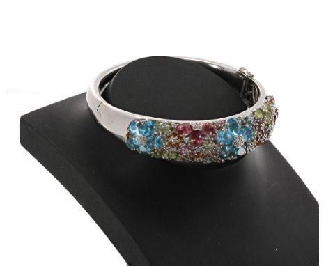 14k white gold multi-coloured gem set hinged bangle, signed Celamoro, width 16mm 36gm (40)
