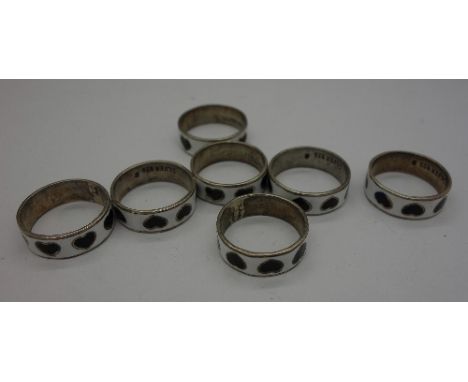 Seven silver and enamel rings
