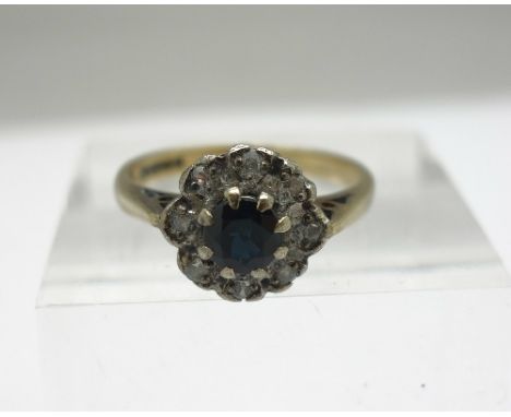 A 9ct gold, diamond and sapphire cluster ring, weight 2.4g, size M