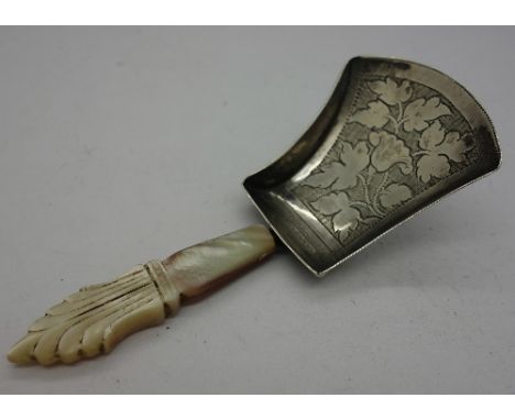 A Georgian silver caddy spoon, mother of pearl handle, Birmingham 1817