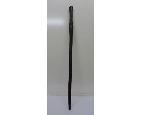 A 19th Century/early 20th Century African hardwood carved stick