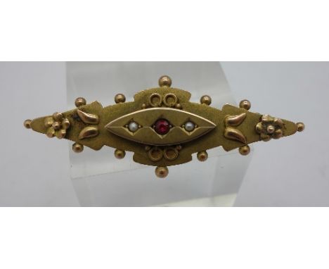A 9ct gold and ruby brooch, weight 2.9g
