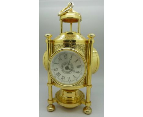 A modern three sided desk brass timepiece, barometer and thermometer, height 25cm
