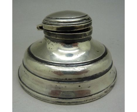 A silver inkwell, Birmingham 1946, lacking glass liner