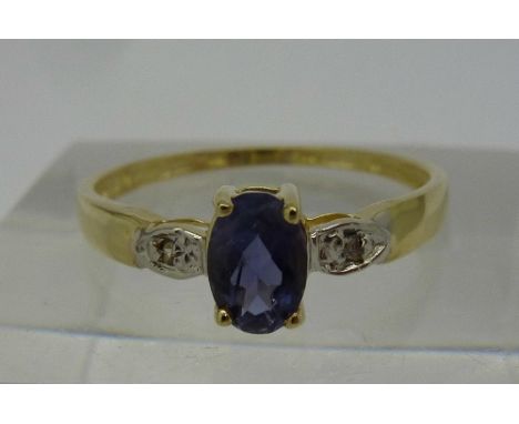 A 9ct gold, sapphire and diamond ring, weight 1.0g, size N