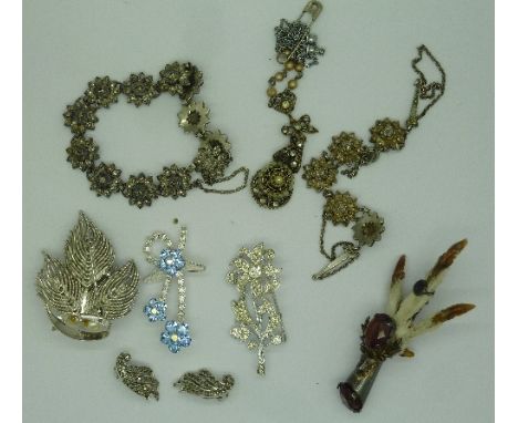 A silver brooch, an Edwardian seed pearl and marcasite necklet, a silver claw brooch, etc.