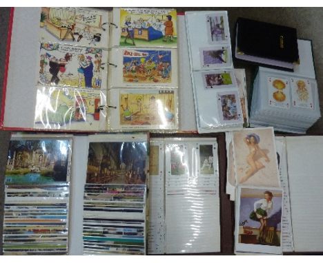 An album of seaside humour postcards, four albums of erotic and glamour playing cards, etc.