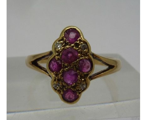 An 18ct gold, ruby and diamond ring, weight 2.6g, size M