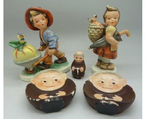 Two Friedel Bavaria West Germany figures of a girl and boy and three Goebel monk figures, Goebel a/f