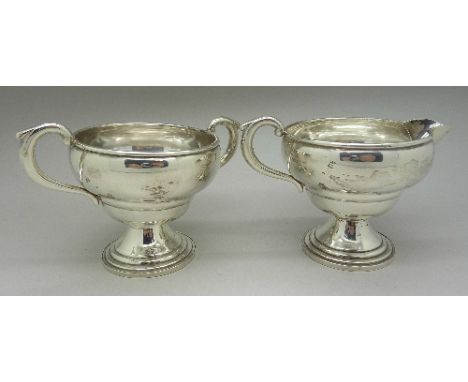 A Garden Silversmiths silver cream jug and sugar bow, marked Sterling, weighted, weight 145g