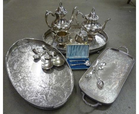 A four piece plated tea service with tray and other plated trays and flatware