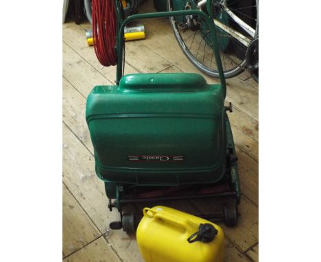 A Qualcast electric cylinder lawnmower with roller 