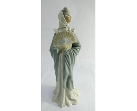 A Nao figurine of a Spanish lady with a fan height 31cms no obvious sign of damage or restoration 