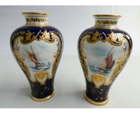 Pair of Royal Crown Derby baluster shaped vases, pained with marine scenes in reserves, signed W E J Dean, printed marks to b