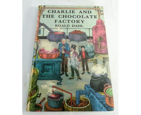 A Roald Dahl 'Charlie and the Chocolate Factory' First Edition hardback     Slight tear to spine and back cover 