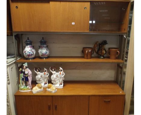 1960s retro teak display unit with sideboard style base and open adjustable ladder rack style display shelves 
