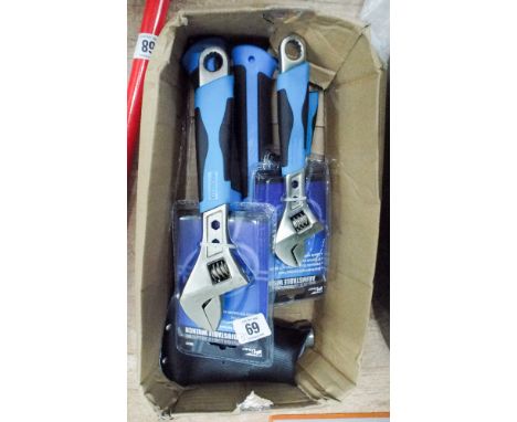 3 assorted adjustable wrenches, a claw hammer and a small axe  