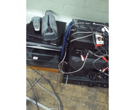 A stacking music system with tape deck, CD rack record deck, CD player, tape to tape machine, sky box etc