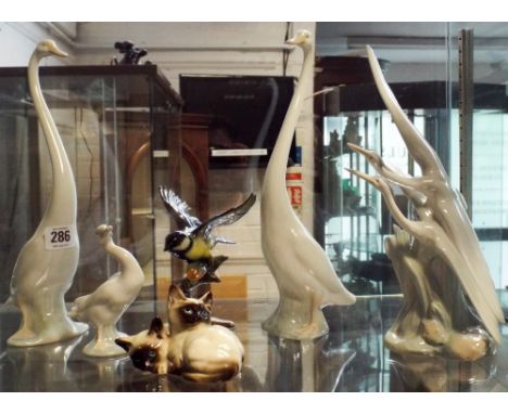 Two Nao long necked geese, a Nao group of cranes, 2 Beswick figures etc