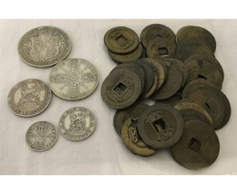 A George V, 1918 silver coin set together with a quantity of 37 Chinese coins.  