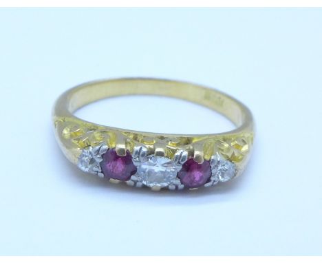 An 18ct gold, diamond and ruby ring, 3.5g, M