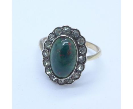 A bloodstone and paste set ring, the shank marked 9ct, 2.7g, K