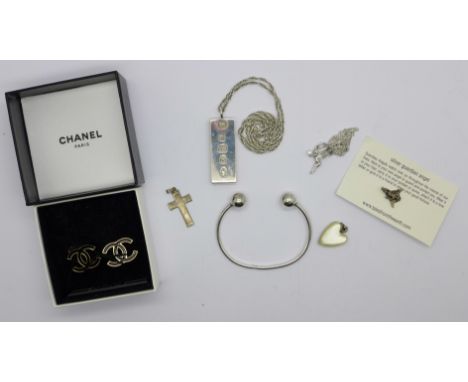 A pair of Chanel earrings, silver bangle, mother of pearl heart pendant and a silver ingot and chain