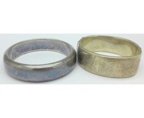 A .925 silver bangle and one other silver bangle, clasp a/f, 89.6g