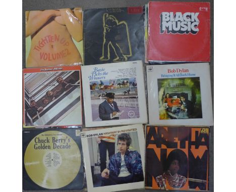 Forty-nine LP records including The Rolling Stones, The Beatles, Reggae and Bob Dylan