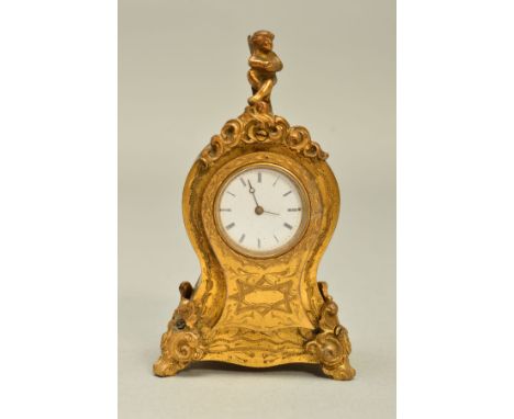 A LATE 19TH CENTURY MINIATURE GILT METAL CLOCK, with cherub finial above balloon shaped case, white enamel dial with Roman nu
