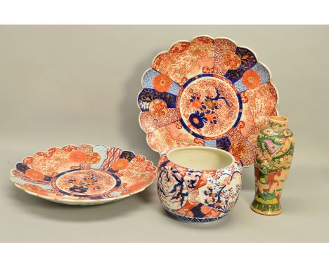 A PAIR OF LATE 19TH CENTURY JAPANESE IMARI PORCELAIN CHARGERS, wavy rims, decorated with flowers, birds and roundels on a fan