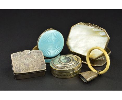 A GEORGE V SILVER AND PALE BLUE ENAMEL POWDER COMPACT, of circular form, engine turned decoration, mirror to inside of hinged