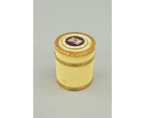 A LATE GEORGIAN IVORY, ENAMEL AND GOLD MOUNTED GAMING COUNTER BOX, of cylindrical form, the screw off cover enamelled with Ki