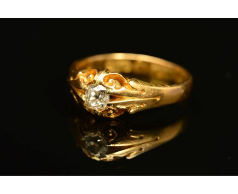 A MID VICTORIAN 18CT GOLD SINGLE STONE DIAMOND RING, set with an old cut diamond to the scrolling gallery, estimated diamond 