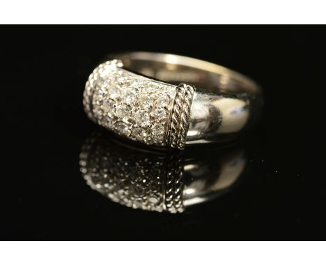 A MODERN PICCHIOTTI 18CT WHITE GOLD AND DIAMOND SET RING, pave diamond set, together with a certificate of authenticity, esti