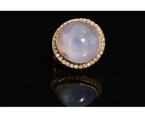 A VICTORIAN GOLD STAR SAPPHIRE AND WHITE STONE ROUND SMALL CIRCULAR BROOCH, a light purplish-blue star sapphire measuring app