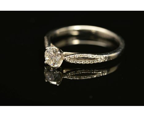 A MODERN DIAMOND SINGLE STONE RING, with diamond crossover set shoulders, principle diamond accompanied by GIA diamond gradin