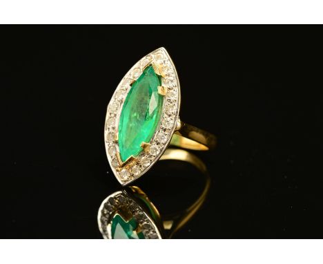 A MODERN 18CT GOLD LARGE EMERALD AND DIAMOND MARQUISE CLUSTER RING, emerald measuring approximately 20.00mm x 7.58mm x 7.2mm,