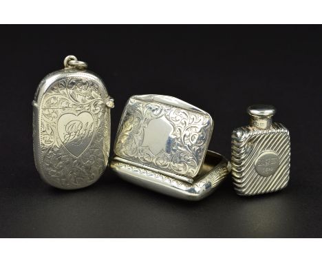 AN EDWARDIAN SILVER SNUFF BOX, of rectangular form, foliate engraved decoration surrounding a shield shaped blind cartouche, 