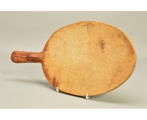 ROBERT (MOUSEMAN) THOMPSON, a carved oak cheese board, oval shape with trademark mouse to the handle, length approximately 38